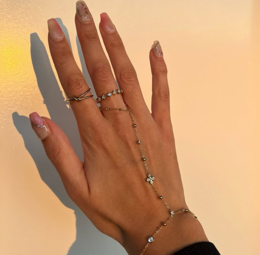 Gold Ring with a unique tilted square design adorned with sparkling zirconia stones - Lavina