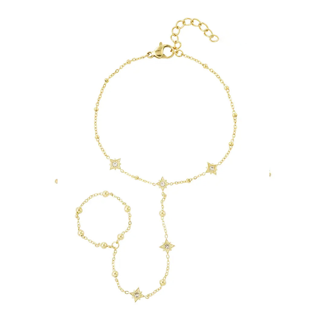 Handchain gold with stars and zirconia stones. Ring and bracelet combination chain.