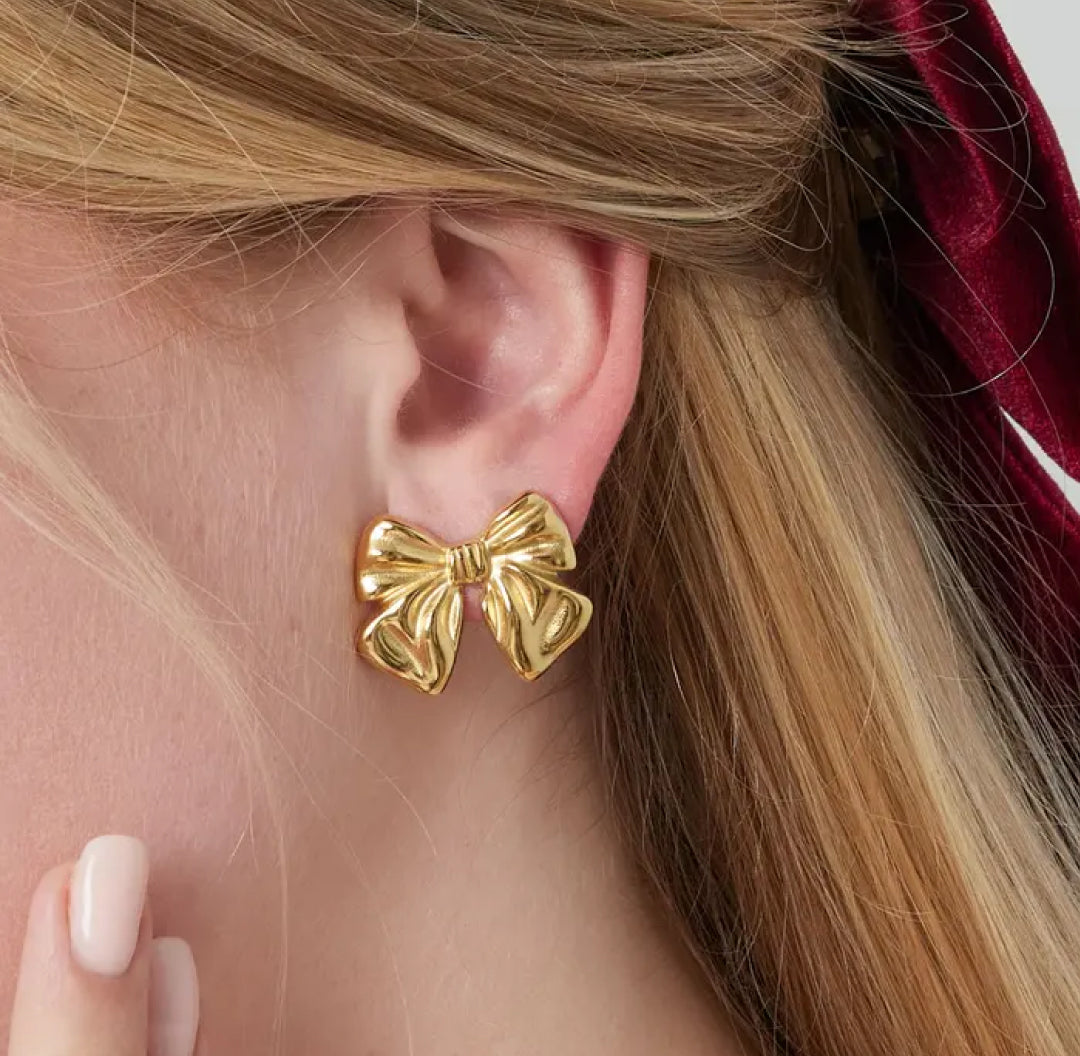 Big gold bow stud earrings - Lavina