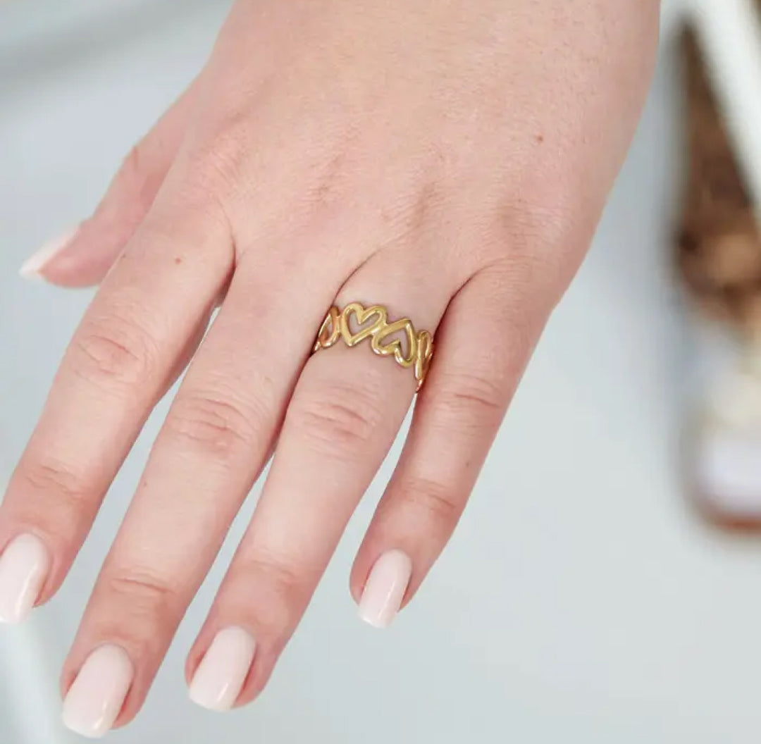 Gold connected open outlined hearts ring - Lavina