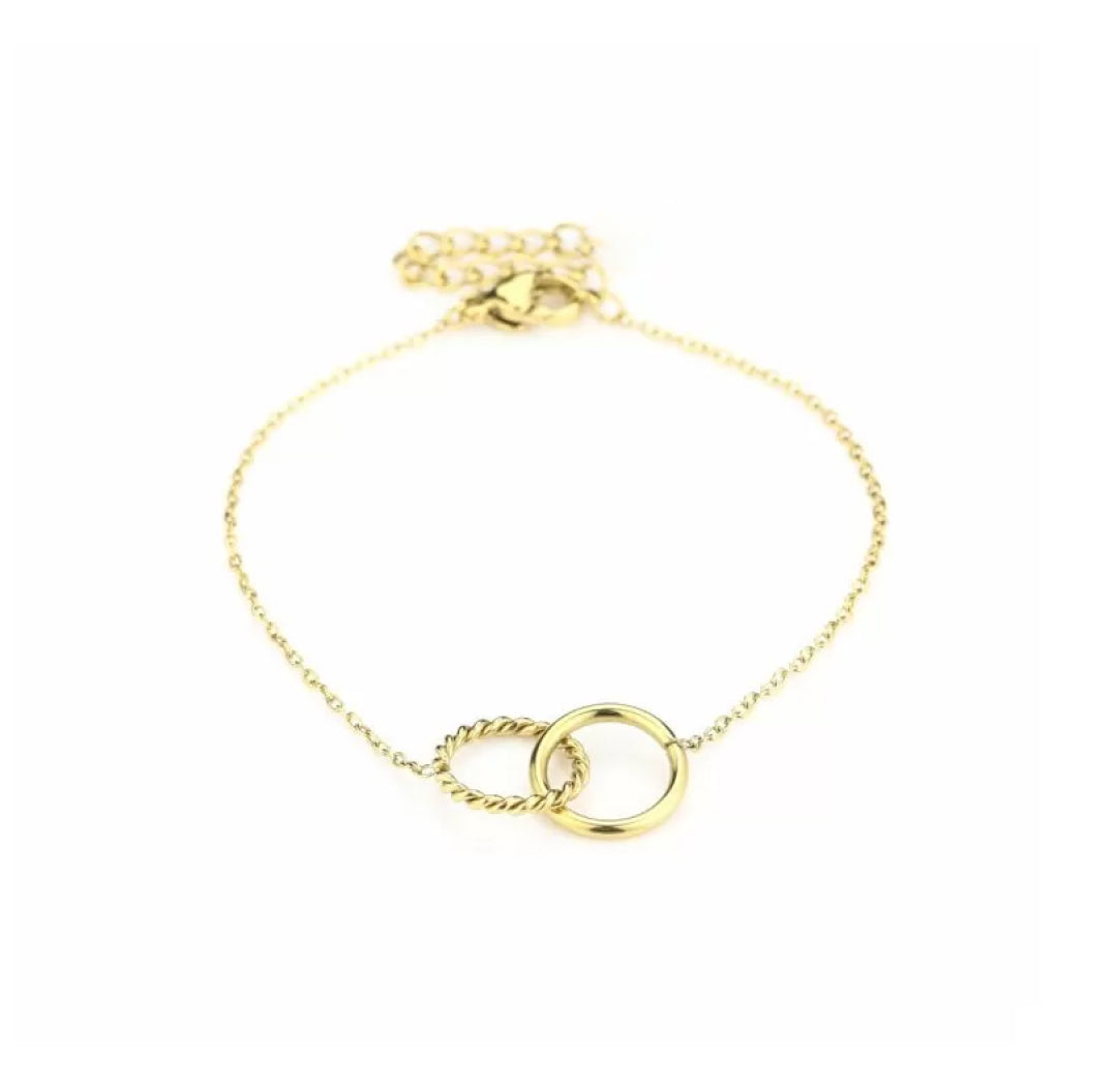 Bonded circle bracelet gold. The circles are intertwined or connected - Lavina