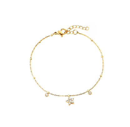 Fine delicate flower bracelet gold with zirconia stones - Lavina Jewelz